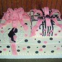 Bridal Cake (Stacked Presents) Pink, white, black bridal cake. It is buttercream frosted, (I so need to work on my smoothing;-) and fondant everything else;-) Thanks for...