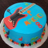Guitar Cake Was told that this little boy loved the guitar, so I came up with this. Buttercream with fondant decorations