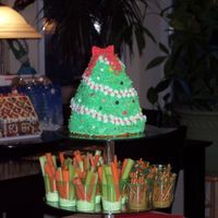 Christmas Tree Cake I used the wilton 3D tree pan. Kids had a blast helping decorate.