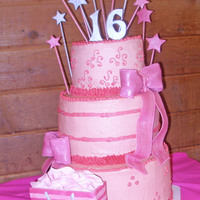 Victoria's Secret Sweet 16 Stars, Bows, and Victoria's Secret bag all made of fondant. Buttercream icing