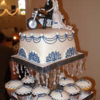 Cupcake And Cake Crystal Cake Tower All covered in MMF, strawberry and chocolate chip cookie dough fillings. Made the stand and hand beaded the crystals