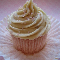 Pink Champagne Cupcake Pink Champagne cupcake filled with strawberry white chocolate ganache and topped off with strawberry champagne buttercream.