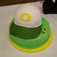 Sean's Cake Yellow cake iced in chocolate buttercream. Groom's favorite college team.