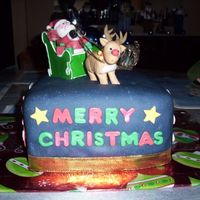 Christmas Cake I made this cake for a family Christmas Party. All the decorations are made out of gumpaste.