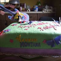 Hannah Montana Cake I made this cake for my cousins birthday it was my second fondant cake. I tried to make the girl look like Hannah Montana as much as I...