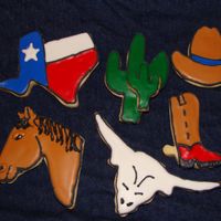Texas Cookies March is Texas month and I made these for the teachers who had March birthdays. I put them in a terra cotta pot with a raffia bow and took...