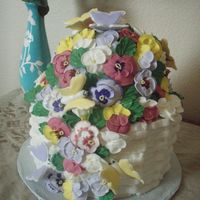 Basket Of Panies This cake is buttercream basket and royal icing butterflies and pansies. I used a ball pan to make the bump on top...next time I think I...