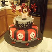 13Th Rocker Birthday This cake was for my friends son. He was turning 13 and having a Rock star theme. The cake is 2 tier with the top tier in chocolate and...