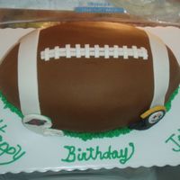 Superbowl...football Cake I made this cake for my cousins birthday party he was having on superbowl Sunday. I made the little helmets out of fondant and hand painted...