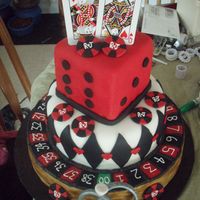 Gambling Bridal Shower Cake! I made this cake for a couple who loves to gamble. They were having a co-ed bridal shower. The cake is all chocolate and covered in Fondant...