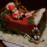 Santa & Rudolph First Novelty Cake, Chocolate cake, covered in fondant. All decor out of GP.