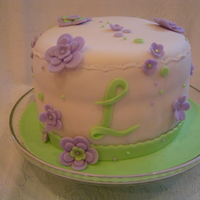 Lilac & Green Flowers A quickie for my neighbors birthday. Blueberry with white choc cream cheese filling.