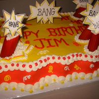 Life Is A Bang At 40! I created this cake from a pic that a customer gave to me. I made the dynamite sticks from tinted manicotti noodles, and they kept cracking...