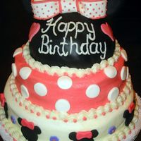 Minnie Mouse My attempt at reproducing Tguess3494's Minnie Mouse cake. Note to self... Next time, check the photo before the cake is picked up!...