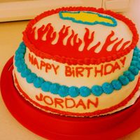 Chevy My husband wanted a Chevrolet cake so I made him one for his birthday. He drew the flames how he wanted them and I traced from parchment...