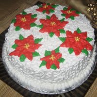 X-Mas Cake This was one of my first cake I made for x-mas. I learned the techniques seen on a toutorial. Yellow cake with strawbery filling. It was...