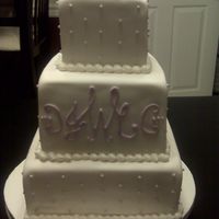 Purple Monogram Cake I apologize for the poor picture quality. This picture was taken with a camera phone.