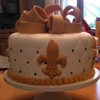 Saints Super Bowl Cake For my 2010 Super Bowl Party; Butter chocolate cake with MMF and buttercream.