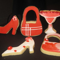 Ladies Night Out NFSC with MMF and royal icing. Love playing with the colors and patterns on shoes and purse cookies!