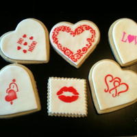 Valentine's Day - Stencil Cookies Using the stencils for Valentine's Day cookies! Did these in a lot of different color combinations. NFSC with MMF and Royal Icing...