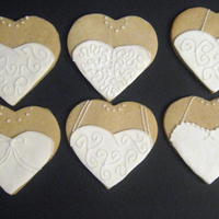 Wedding Gown Cookies NFSC with MMF and royal icing. I was very pleased with how they turned out!