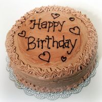 Mom's Birthday Cake Whimsical Bakehouse's Freckled Mocha Cake. Bailey's Irish Cream mousse filling, chocolate buttercream frosting.