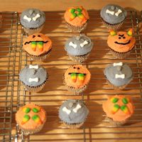 Halloween Cupcakes Apple-brown sugar cupcakes with cinnamon buttercream and candy toppers.