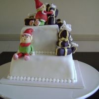 Elf Christmas Cake I made this for my family for Christmas - cake is fruit cake and decorations all mmf.