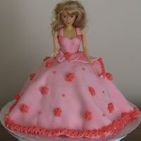 3D Doll My first attempt at a 3D doll cake for my daughter turning 4 this week-end.Chocolate cake covered with fondant, buttercream icing for the...