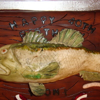 Largemouth Bass This was my very first sculpted fish cake. It was a widemouth bass cake for a friend. I am not the best at painting and my fish tail...