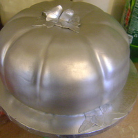 Silver Pumpkin One of three pumpkins for a fall themed wedding. Hummingbird cake covered in fondant and painted silver.