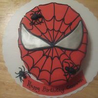Spiderman Cake Rainbow white cake, fondant covered. Client sent me photo she found on line and asked that I replicate. Web out of fondant extruded from...