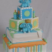 Baby Shower Cake This is fun to make. Elephants and bottles were made out of gumpaste. TFL!
