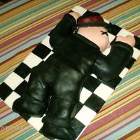 Mafia Wars Cake Made for a friends birthday cake. Butter cake with real strawberry buttercream icing. All fondant.