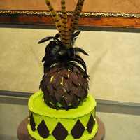 Feathers And Diamonds Practice cake...want to try my ball cake pan and try molding chocolate.Leaves and diamonds are molding choc, buttercream icing and real...