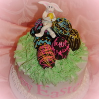 Easter Bunny Buttercream with chocolate truffel eggs. Gumpaste bunny