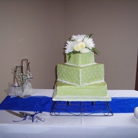Pearls Pearls And More Pearls! This was my first wedding cake! The brides colors were green and blue and she wanted a green cake. I was so nervous about getting the color...