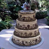 4 Tier Round Flowers Wedding Cake This 4 tier Round Wedding Cake made with buttercream smooth out and free hand Royal icing flowers.....to match the bride invitation