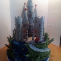 Castle Cake Second Place in American Culinary Federation Cake Competition.Castle made with Fondant and the Stain glass is melted life saver candy, the...