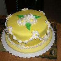 Last Cake For Fondant And Gumpaste Class Here is the cake I made for my last Wilton fondant and gumpast class. It a fondant covered cake with fondant and gumpaste accessories.