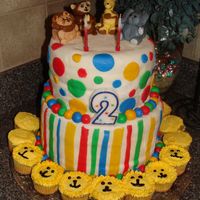2Nd Birthday Cake, My first attempt at Fondant. I had a few air bubbles, but learned alot! White cake with homemade buttercream icing. MMF decorations.