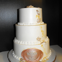 Beach Wedding Cake 6,8,10 inch rounds. Buttercream icing and fondant shells.
