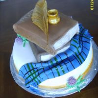 Poet Robert Burns Cake books,scarf and cake covered with fondant, quill, ink pot, flowers made from gumpaste. cakes are irish cream and dark chocolate drambuie.