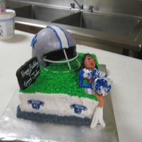Dallas Cowboys Birthday Cake My first time ever making a helmet and molding people! I love my cheerleader!!
