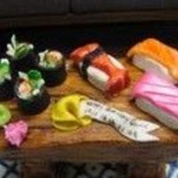 Sushi Cake One of my best friends love sushi, so I made this cake for her for her birthday. She loved it!! I found the instructions in the Confetti...