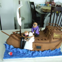 Pirate Ship Chocolate Cake with Buttercream Icing. All decorations are made from fondant.