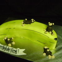 Monkeys On Giant Banana Inspired by a photo I seen here. The birthday girl loved it! 1 11x15 cake halved then hand carved. Covered in buttercream then fondant....