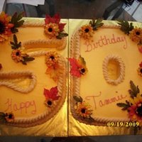 50Th Birthday Cake I baked 2 sheet cakes and carved each one into the number 5 and the number 0. All buttercream icing on white cake with silk flowers for...