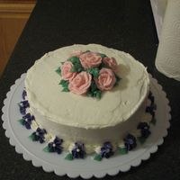Flower Cake My last cake done in the Wilton class. I forgot to smooth out the buttercream..