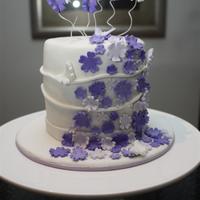 Flowers And Butterflies Apple/maple/pecan cake with maple buttercream and white chocolate ganache.